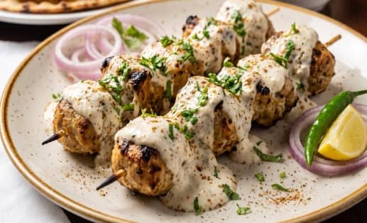 Malai chaap on skewers with cream gravy